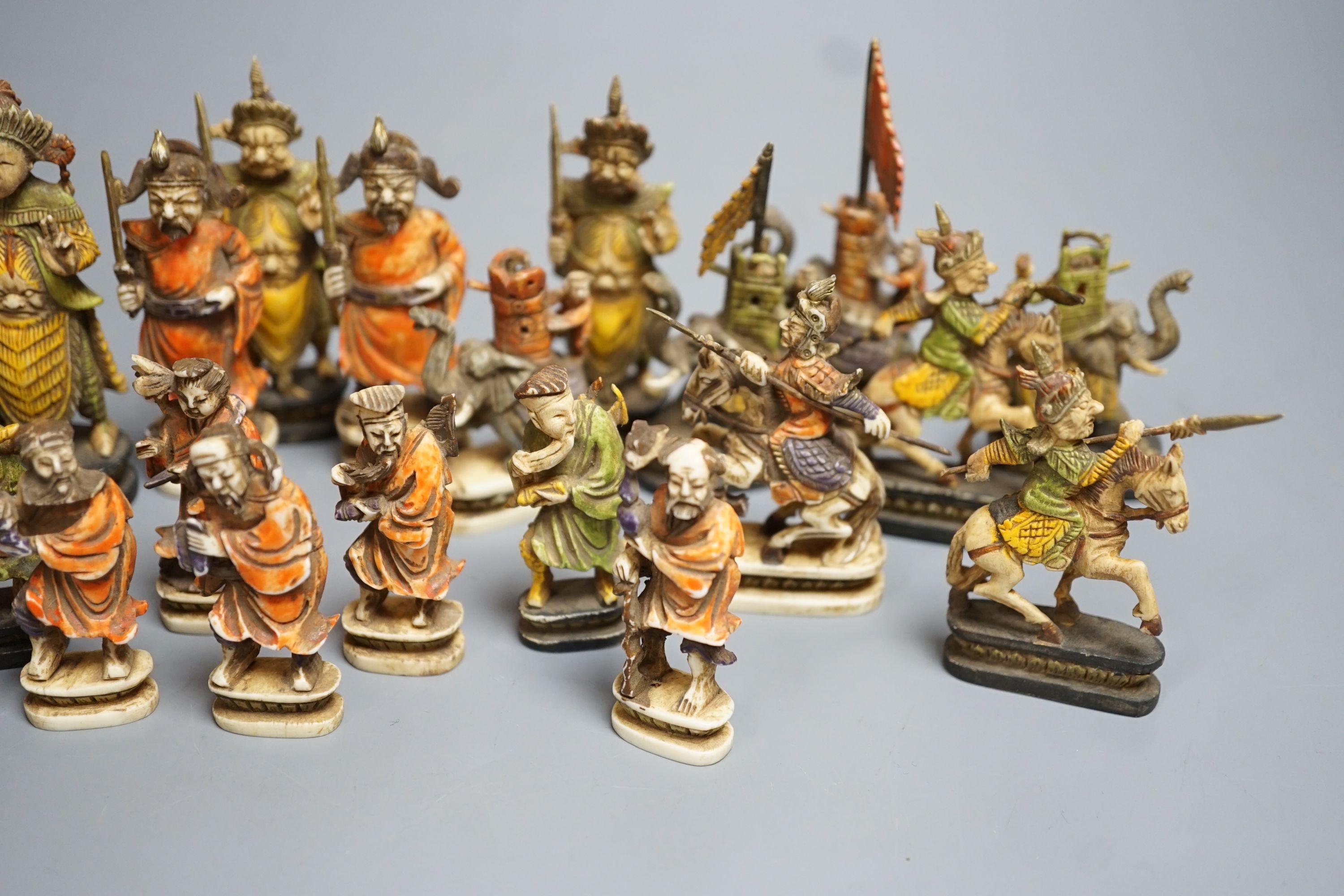 An early 20th century south East Asian stained ivory chess set
